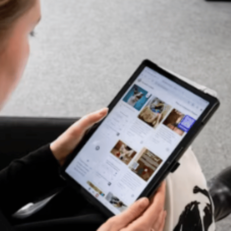 Person looking on her tablet